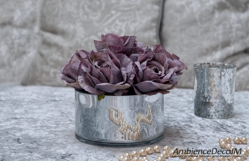 Luxury silk purple roses in vase