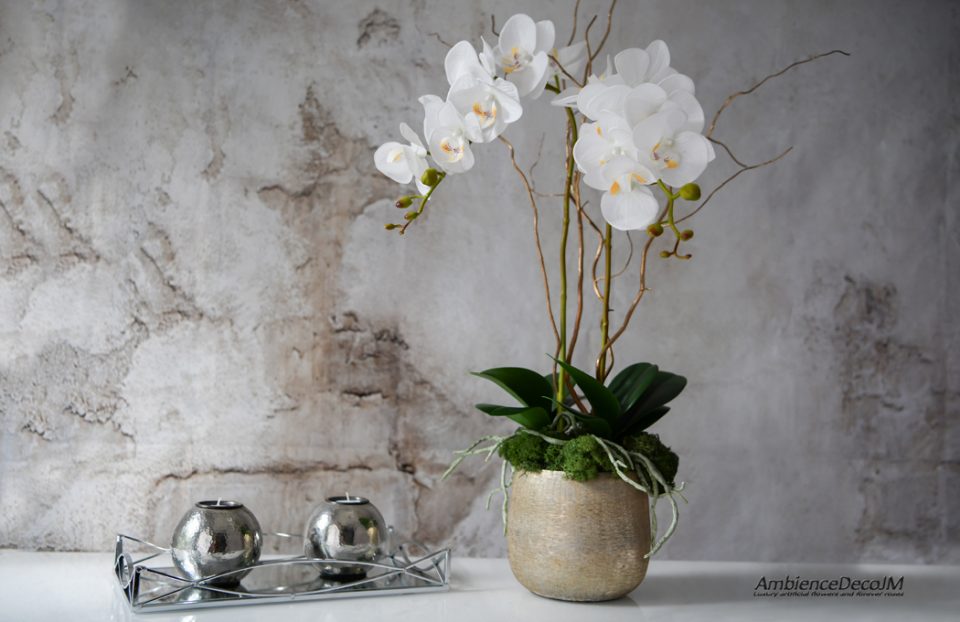 Real touch orchids in golden pot